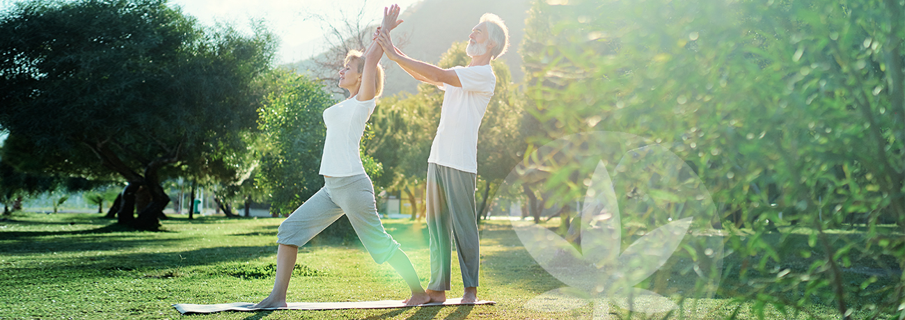 Older couple doing yoga